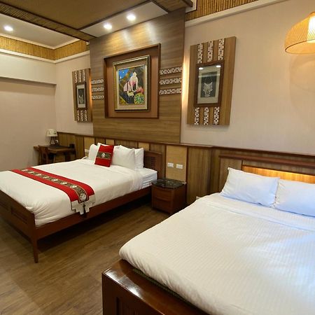 Ferienwohnung 山花映水紅莊園民宿 Yuemei Exterior foto