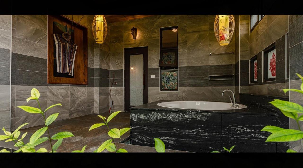 Ferienwohnung 山花映水紅莊園民宿 Yuemei Exterior foto